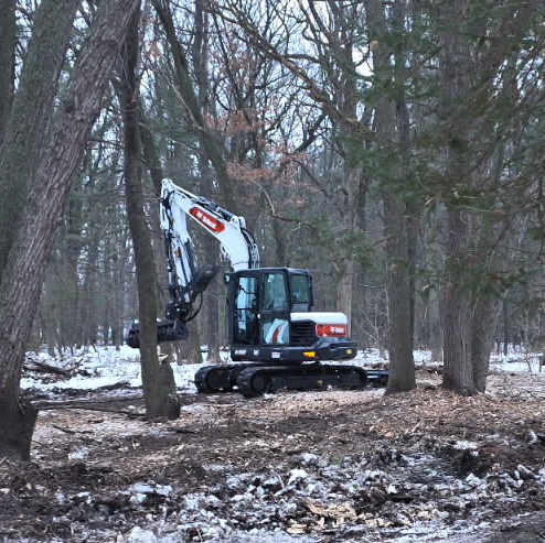 Excavator with Mulching Head